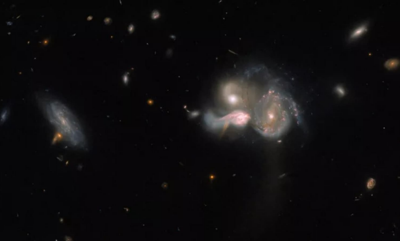 OH!  NASA's Hubble Space Telescope detects a rare three-galaxy collision