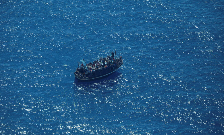 Italian coast guard rescues hundreds of migrants in 'turbulent' days at sea
