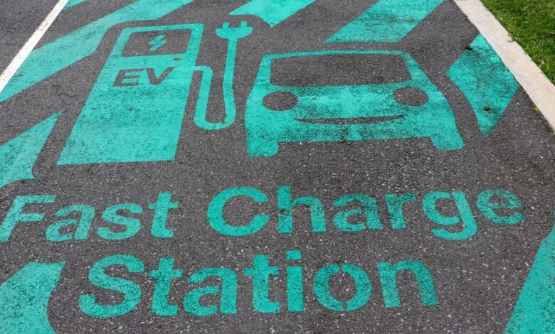 Is it legal to park a car at an electric vehicle charging station without charging it?