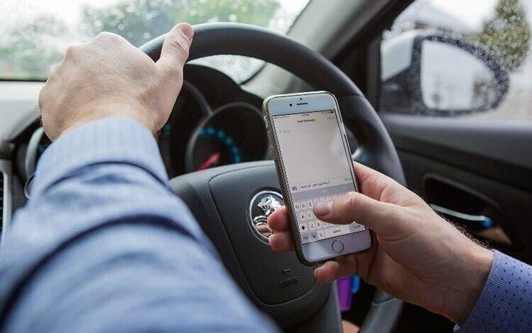 Is it illegal to use a cell phone while driving?