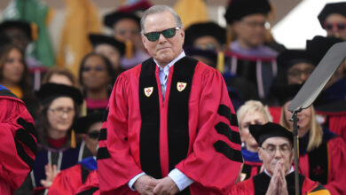 The CEO of Warner Bros.  booed by Boston University graduates during his commencement speech : NPR