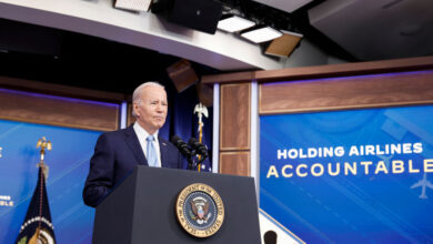 Biden urges airlines to pay passengers for long delays