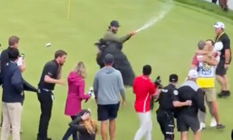 WATCH: Canadian golfer Adam Hadwin is handled by security after compatriot Nick Taylor wins RBC Canada Open