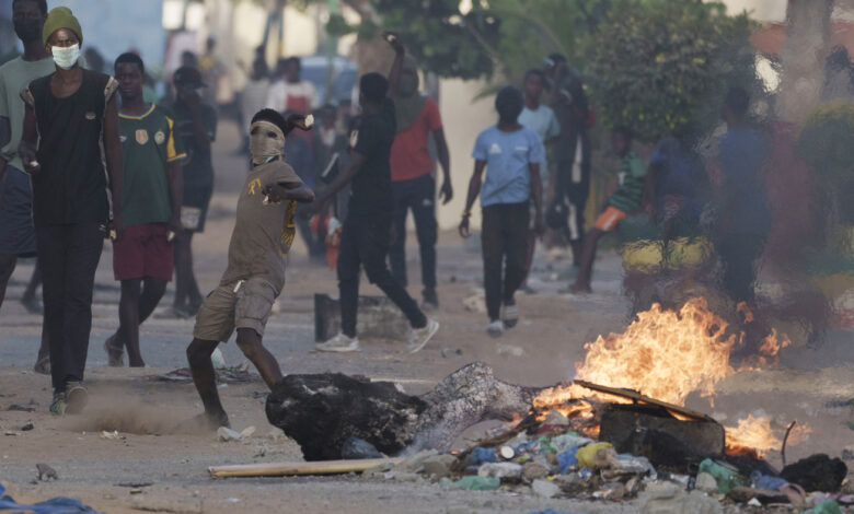 Death toll in Senegal protests rises to 15 as opposition supporters clash with police : NPR