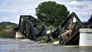 A train carrying hazardous materials plunges into the Yellowstone River after the bridge is damaged : NPR