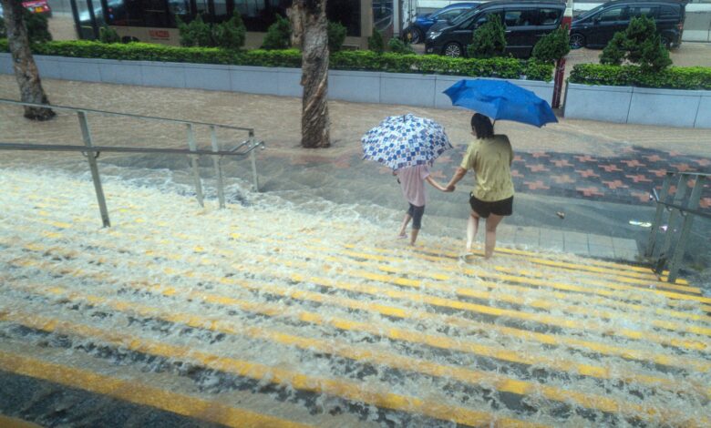 More Than 100 Injured In Hong Kong After Record Rain & Typhoon