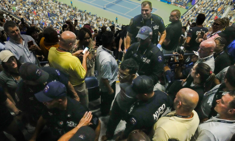 A climate protester glued his feet to floor and interrupted U.S. Open semifinal : NPR