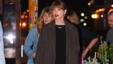 Taylor Swift Styled Black Boots And A Brown Coat In New York