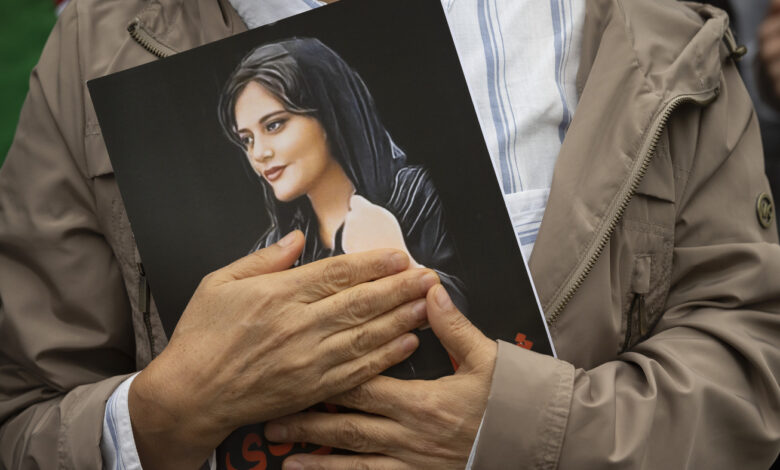Mahsa Amini's family barred from leaving Iran to receive EU honor : NPR