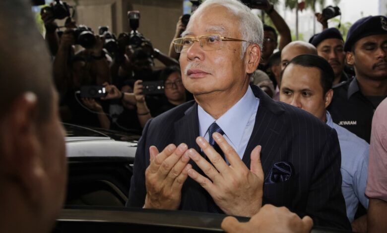 Malaysia halves jail sentence of ex-prime minister Najib
