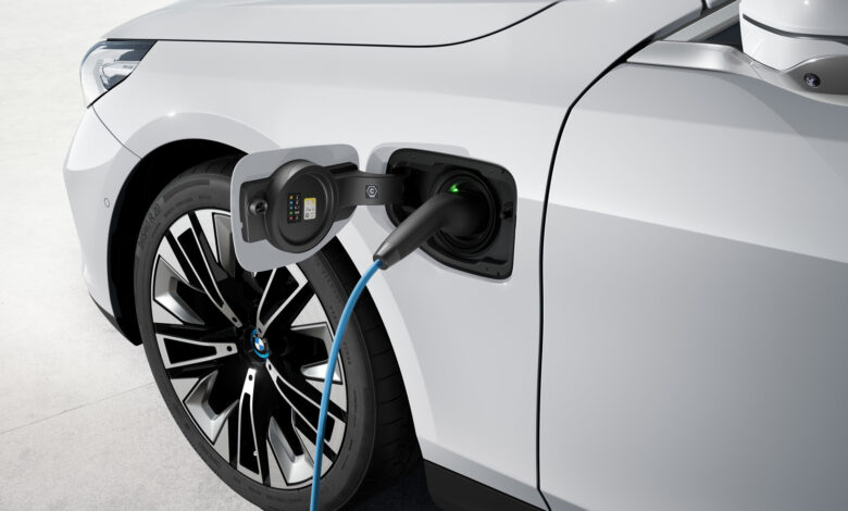 BMW electric wagon, Kia Carnival Hybrid minivan, Tesla chargers at hotels: Today’s Car News