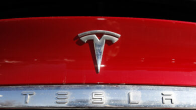 Tesla recalls nearly 2.2M vehicles to fix warning lights : NPR