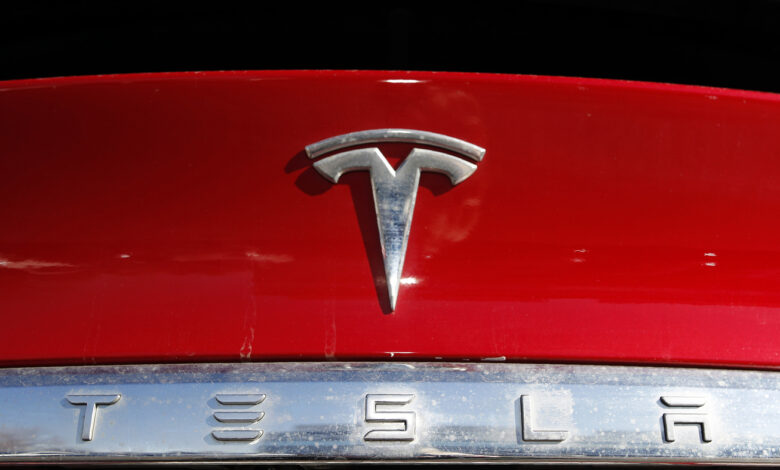 Tesla recalls nearly 2.2M vehicles to fix warning lights : NPR