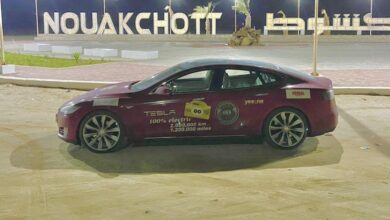 How many batteries and motors are needed for this Tesla to travel 2 million km?