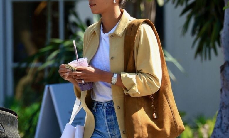EmRata and Laura Harrier both wore chic yellow and camel outfits