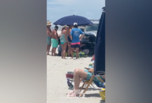Police kill woman with beach patrol car