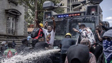 Images show police clashing with protesters