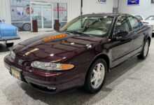 An 86-mile Oldsmobile Alero sells for more than a new Toyota Corolla