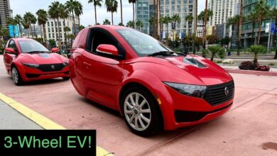 Hundreds of These Horrible EVs Are Piled Up in a Scrapyard Waiting for a Crusher