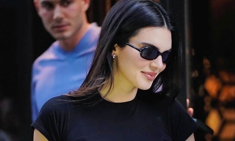 Kendall Jenner in elegant dress and flip flops in Paris