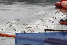 Belgian Olympian falls ill after swimming in Seine: NPR